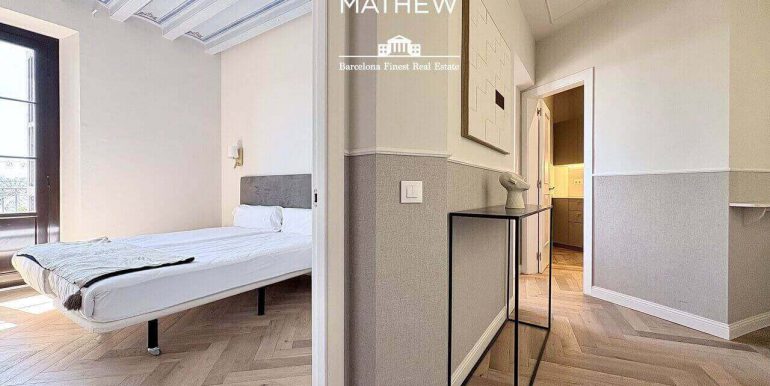 elegante-piso-de-diseno-frente-al-port-vell-con-rooftop-y-vistas-al-mar-habitacion-9