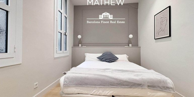 elegante-piso-en-venta-de-disenocon-dos-habitaciones-frente-al-port-vell-con-rooftop-y-vistas-al-mar-habitacion-8