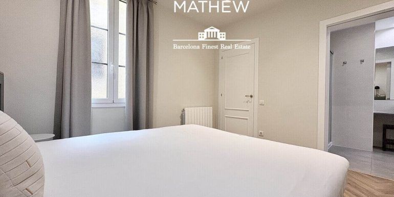 exclusiva-residencia-a-estrenar-en-venta-frente-al-port-vell-con-rooftop-premium-y-esencia-historica-habitacion-3