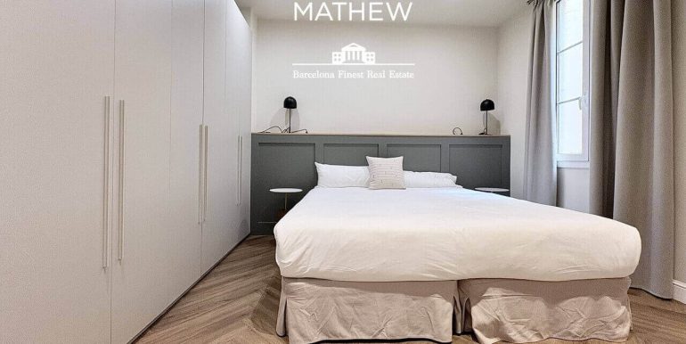 exclusiva-residencia-a-estrenar-en-venta-frente-al-port-vell-con-rooftop-premium-y-esencia-historica-habitacion-5
