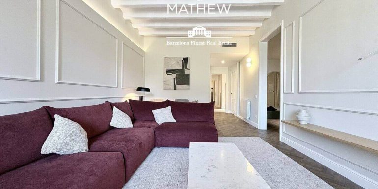 exclusiva-residencia-a-estrenar-en-venta-frente-al-port-vell-con-rooftop-premium-y-esencia-historica-salon-3