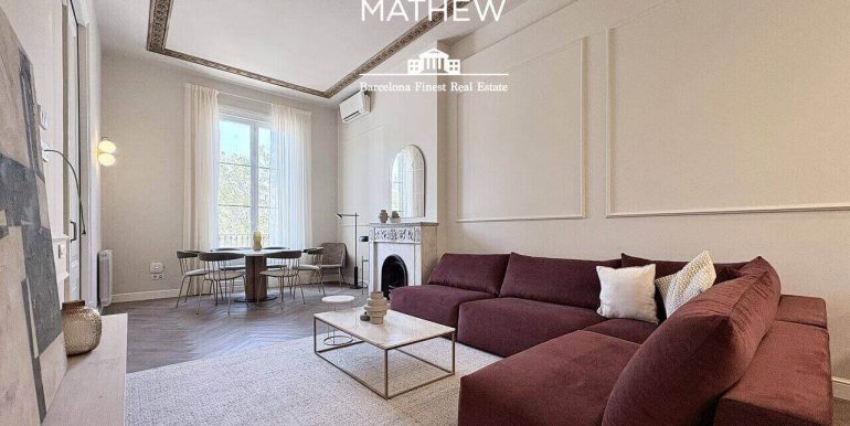 exclusiva-residencia-de-diseno-en-venta-frente-al-port-vell-con-rooftop-historia-y-elegancia-contemporanea-salon-