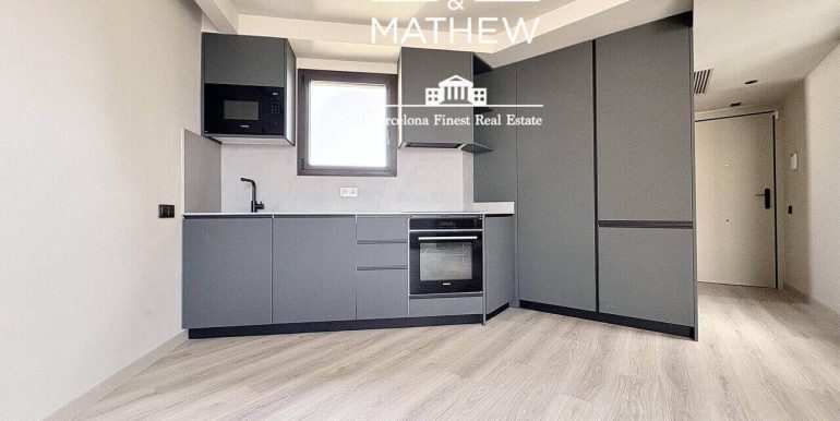 atico-de-lujo-a-estrenar-en-venta-con-terraza-y-rooftop-privado-en-el-quadrat-dor-cocina-3