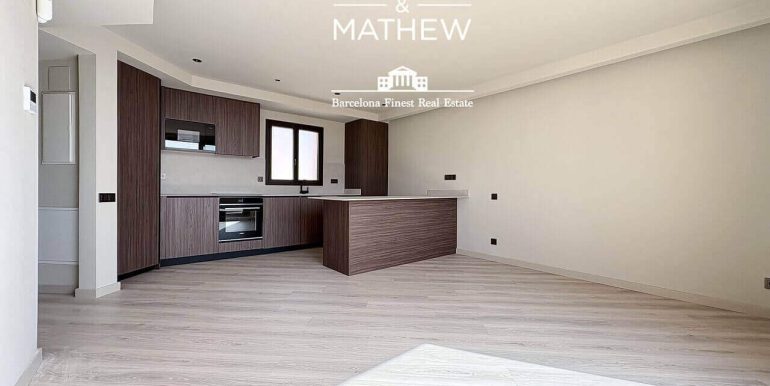 atico-de-lujo-a-estrenar-en-venta-con-terraza-y-rooftop-privado-en-el-quadrat-dor-y-con-vistas-a-la-sagrada-familia-salon-1