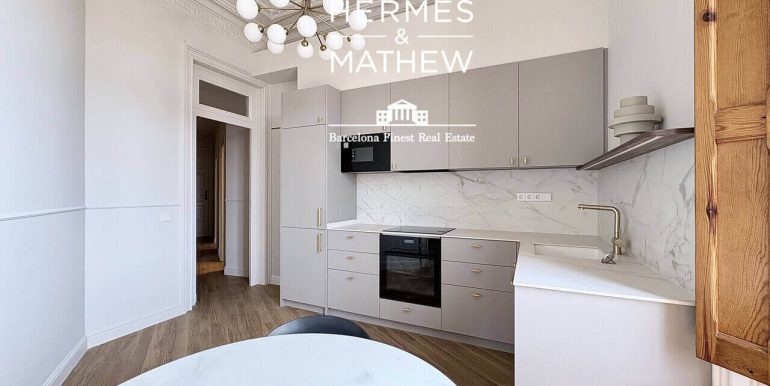 exclusivo-piso-en-venta-de-dos-habitaciones-y-dos-banos-en-el-born-·-una-joya-senorial-con-piscina-y-vistas-al-puerto-cocina-4