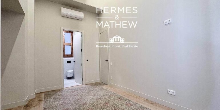 piso-en-venta-junto-a-placa-catalunya -diseño-contemporaneo-y-esencia-historica-habitacion-4