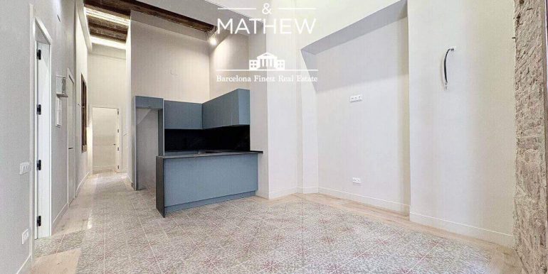 piso-en-venta-junto-a-placa-catalunya -diseño-contemporaneo-y-esencia-historica-salon-3