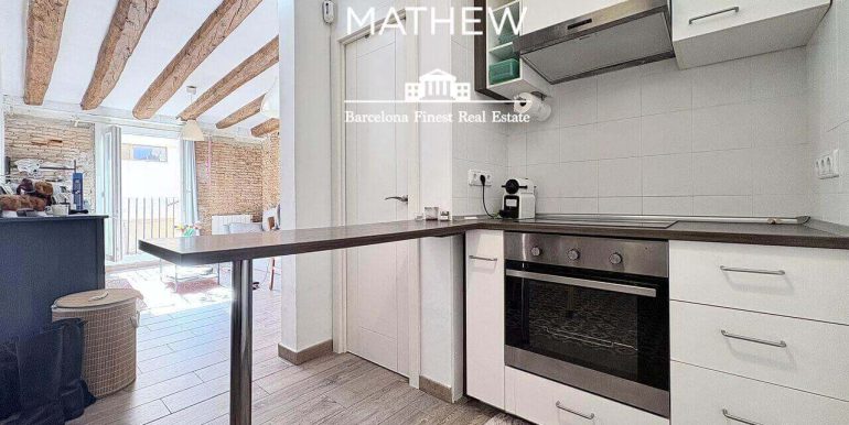 piso-en-venta-de-una-habitacion-en-el-raval-encanto-historico-y-esencia-contemporanea-cocina-1