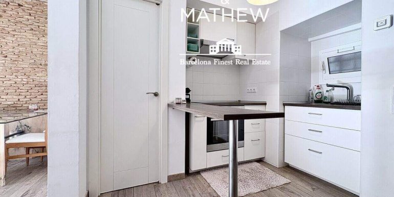 piso-en-venta-de-una-habitacion-en-el-raval-encanto-historico-y-esencia-contemporanea-cocina-3