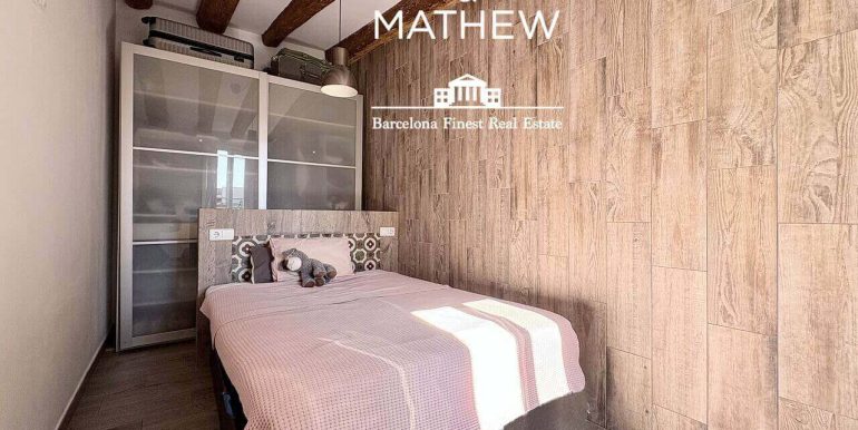 piso-en-venta-de-una-habitacion-en-el-raval-encanto-historico-y-esencia-contemporanea-habitacion-1