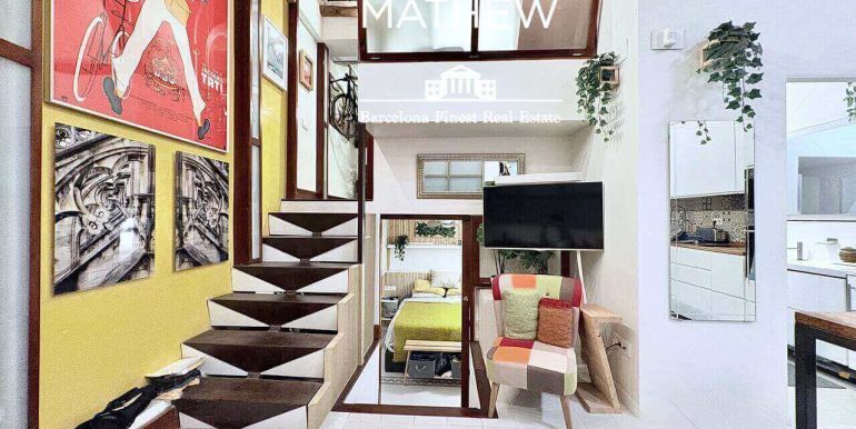 singular-propiedad-en-venta-en-el-raval- un-refugio-de-diseno-con-esencia-barcelonesa-junto-al-parallel-salon-12