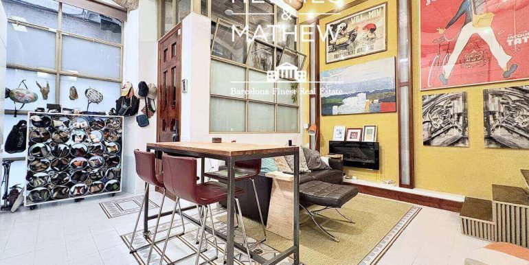 singular-propiedad-en-venta-en-el-raval- un-refugio-de-diseno-con-esencia-barcelonesa-junto-al-parallel-salon-6